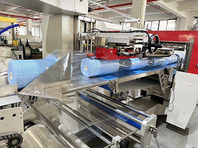 Non-woven Roll Packaging Machine | High Speed Reciprocating Type